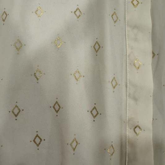 Camisa blanca con dorado